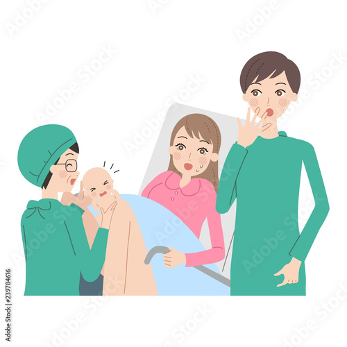 出産する女性。