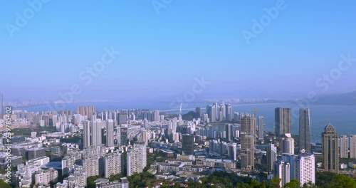 Wallpaper Mural cityscape of buildings in Shenzhen Guangdong south China,dense buildings under blue sky,bridge over the ocean Torontodigital.ca