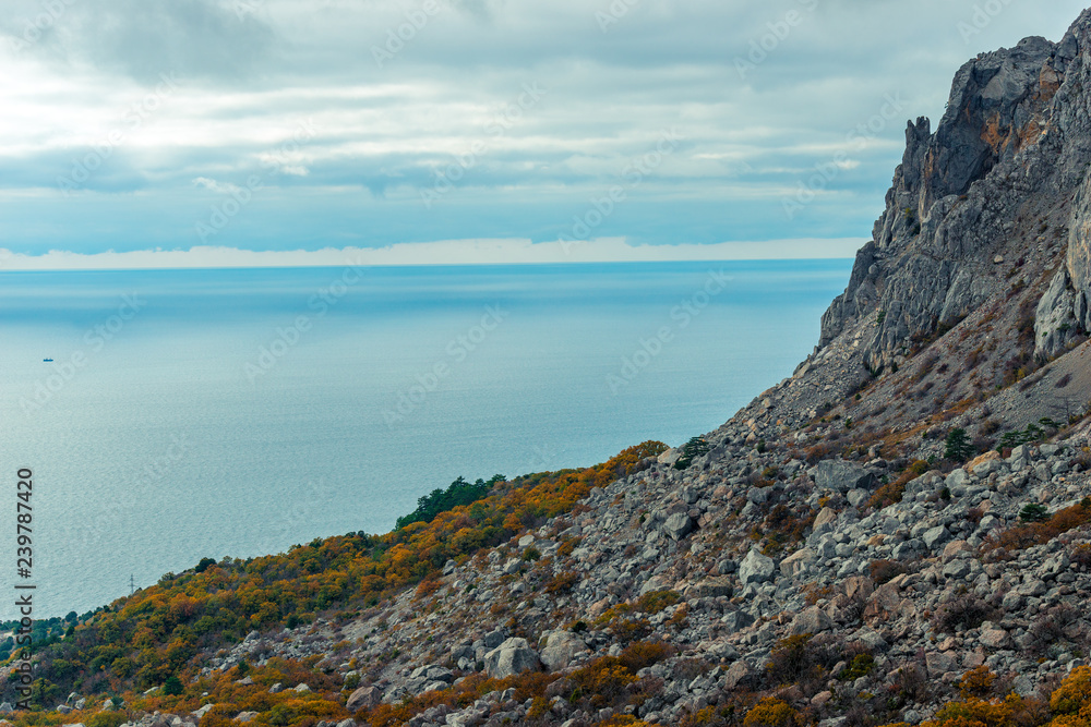 Rocky coast, view of the calm Black Sea, landscape of Crimea, Russia