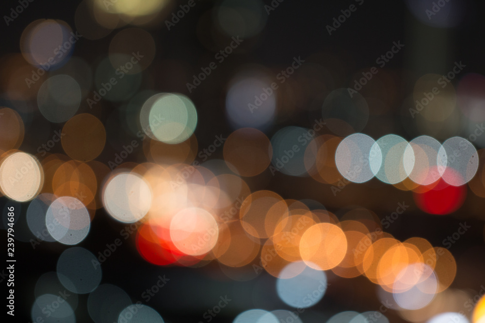Defocused city night light blurred with bokeh abstract background. Defocused city night light blurred with bokeh abstract background.