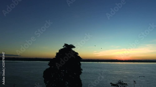 Dusk on the Mekong river. Looking from Mukdahan, Thailand across to Savannakhet in Laos.