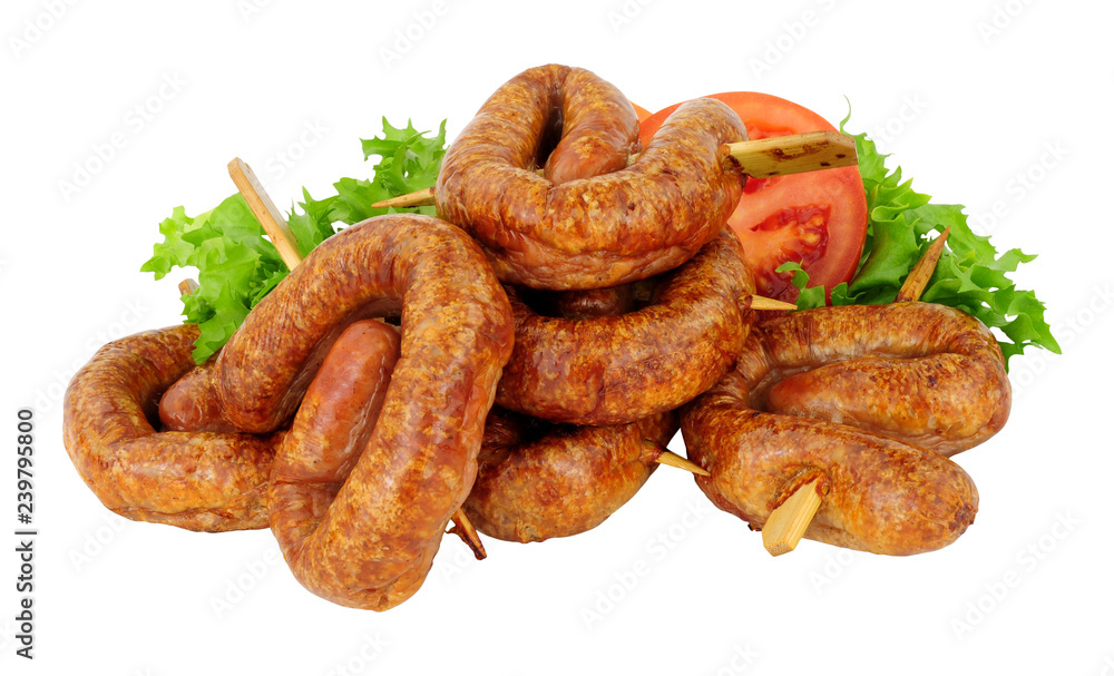 Group of curly buffet sausages on wooden skewers isolated on a white background Group of curly buffet sausages on wooden skewers isolated on a white background