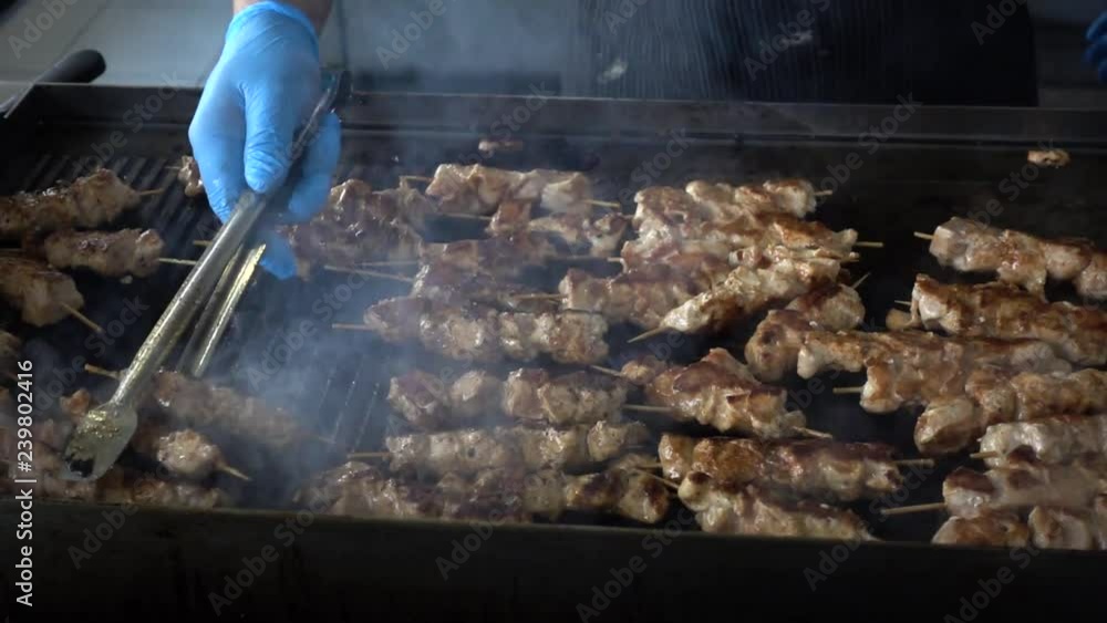 Barbecue party in the open air. Concept of eating and cooking. Barbecue party in the open air. Concept of eating and cooking.