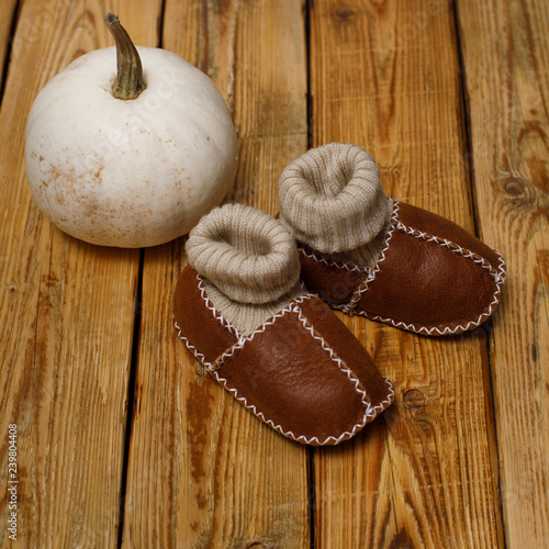 warm shoes on wooden background