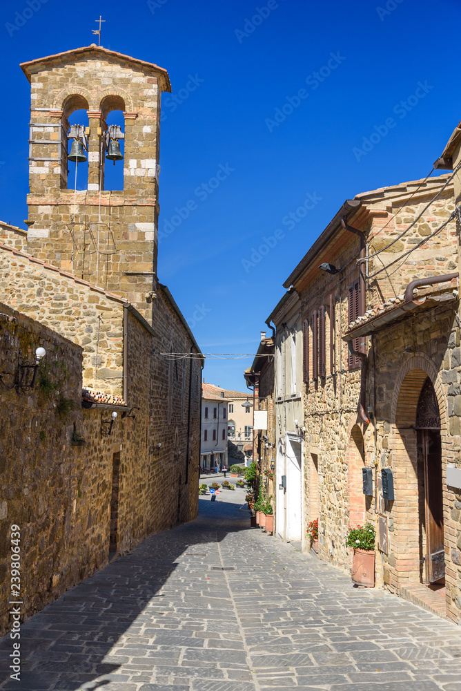 Narrow street in historic center of Montalcino. Italy