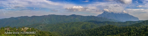 Panoramic mountains of Doi Luang Chiang Dao  and village in forest at Chiang Mai, Thailand. © yotrakbutda