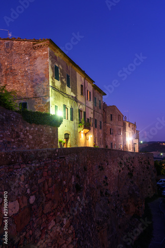 View houses and city wall at night. Pienza. Tuscay. Italy © Elena Odareeva