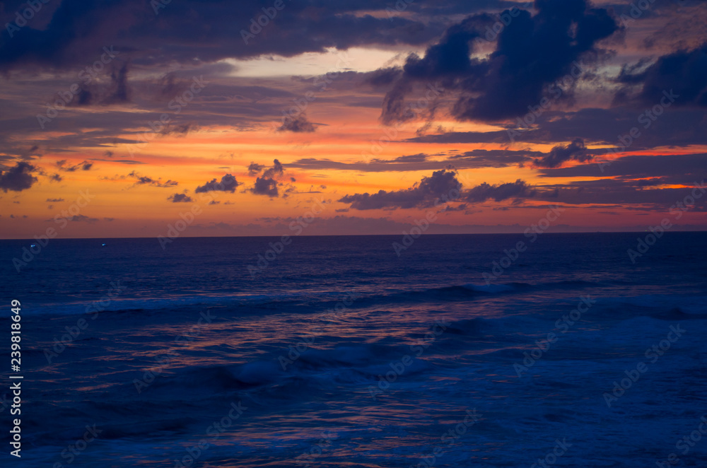 Sunset on the coast of the Indian Ocean in Sri Lanka