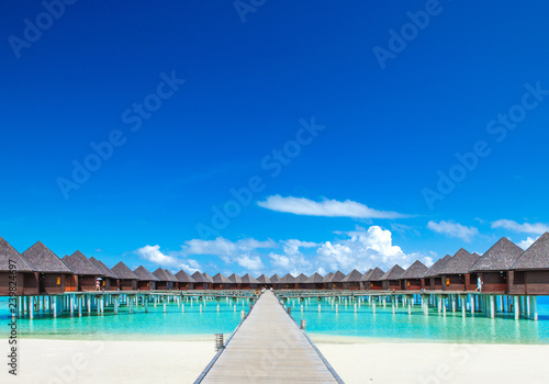 Maldives water bungalow on ocean water landscape © Pakhnyushchyy