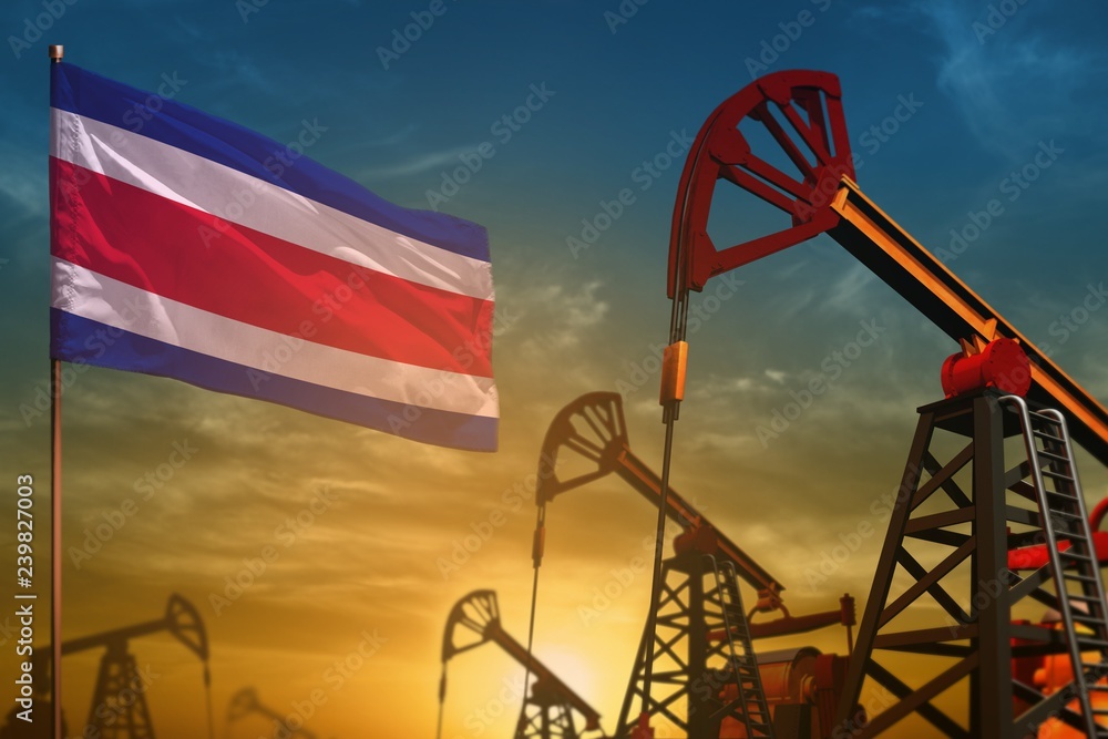 Costa Rica oil industry concept. Industrial illustration - Costa Rica flag and oil wells against the blue and yellow sunset sky background - 3D illustration Costa Rica oil industry concept. Industrial illustration - Costa Rica flag and oil wells against the blue and yellow sunset sky background - 3D illustration