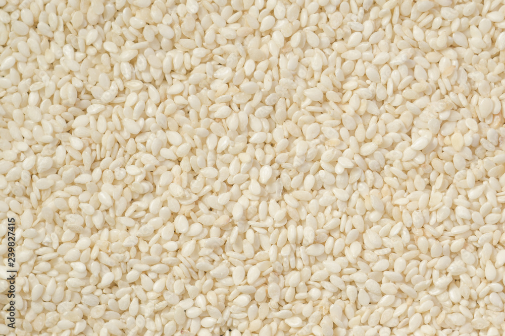 White peeled sesame seeds close up, background, texture White peeled sesame seeds close up, background, texture