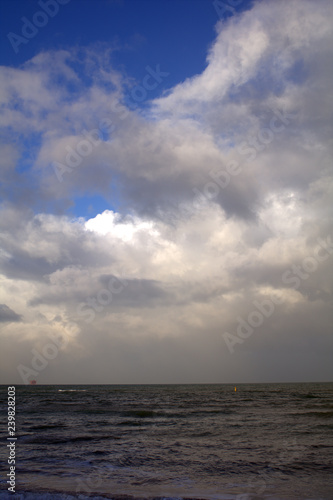 seascape horizon sky white clouds water wave view nature
