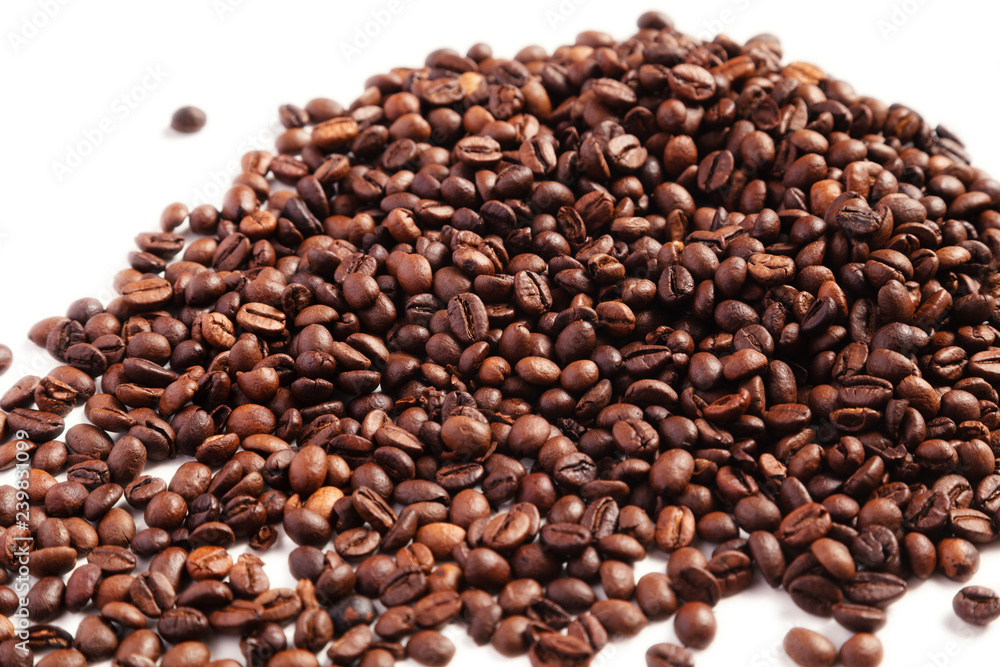 Roasted coffee beans on white background, isolated