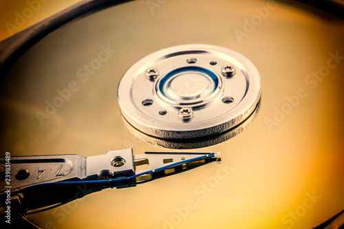 Open computer hard drive on white background photo