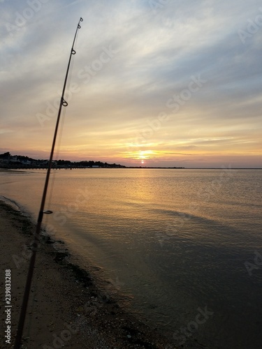 Sunset and fishing rod