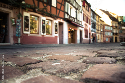 Fototapeta Naklejka Na Ścianę i Meble -  Low perspective of cobblestone street in historic city of Strasbourg France