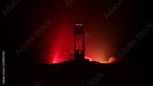 Horror view of Guillotine. Human at guillotine on a dark foggy background. Execution concept photo