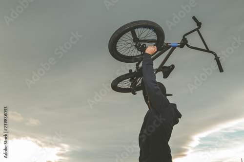 BMX rider. Young man with a bmx bike. Extreme sports