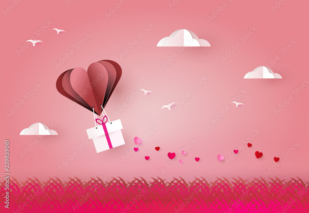 Love and valentine day. Heart air balloon carries gift box