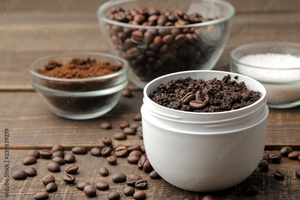 homemade coffee scrub in a white jar for the face and body and various ingredients for making scrub. spa. cosmetics. care cosmetics homemade coffee scrub in a white jar for the face and body and various ingredients for making scrub. spa. cosmetics. care cosmetics
