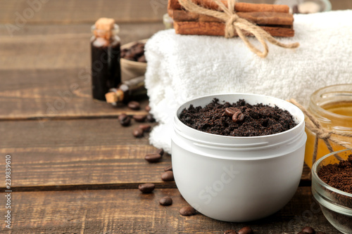homemade coffee scrub in a white jar for the face and body and various ingredients for making scrub. spa. cosmetics. care cosmetics