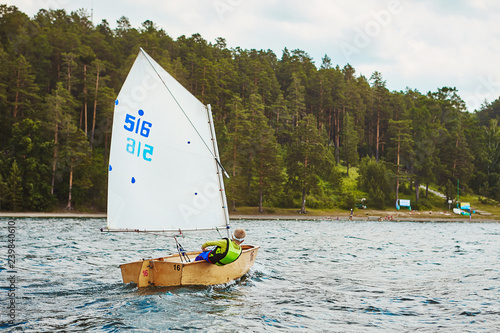 Sailing training yachting sport kids in lake