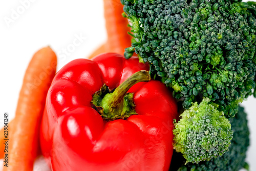 a fresh group of vegetables on white background