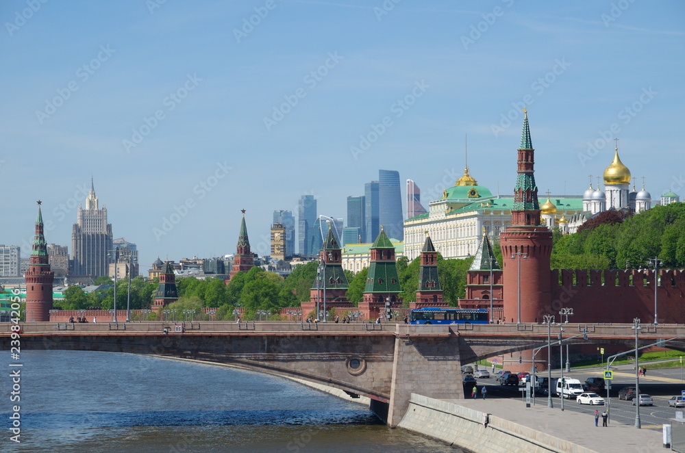 Spring view of the Moscow Kremlin, Big Moskvoretsky bridge and Moskvoretskaya embankment, Moscow, Russia