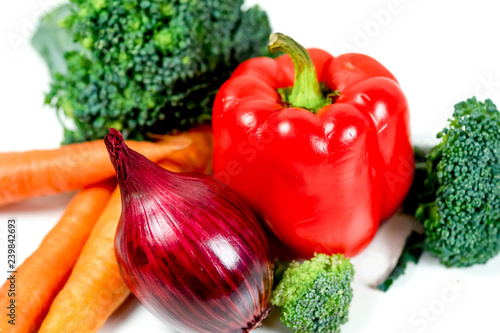 a fresh group of vegetables on white background