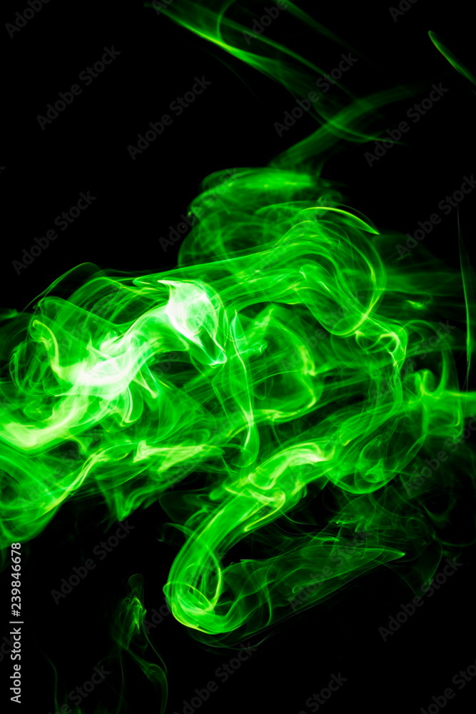 Green smoke on black background Green smoke on black background