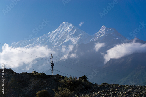 Great Himalayas with telephone pole in Jomsom Nepal