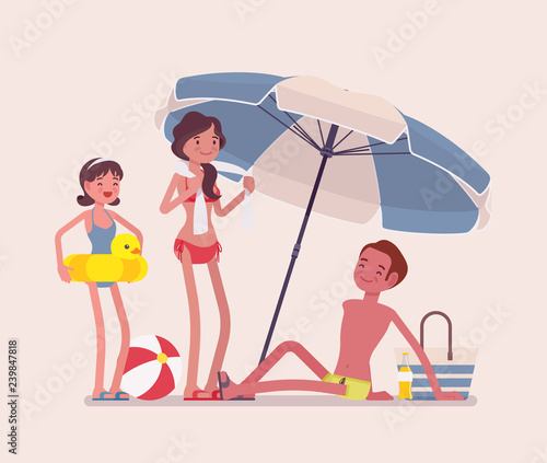 Happy family enjoy rest at the beach