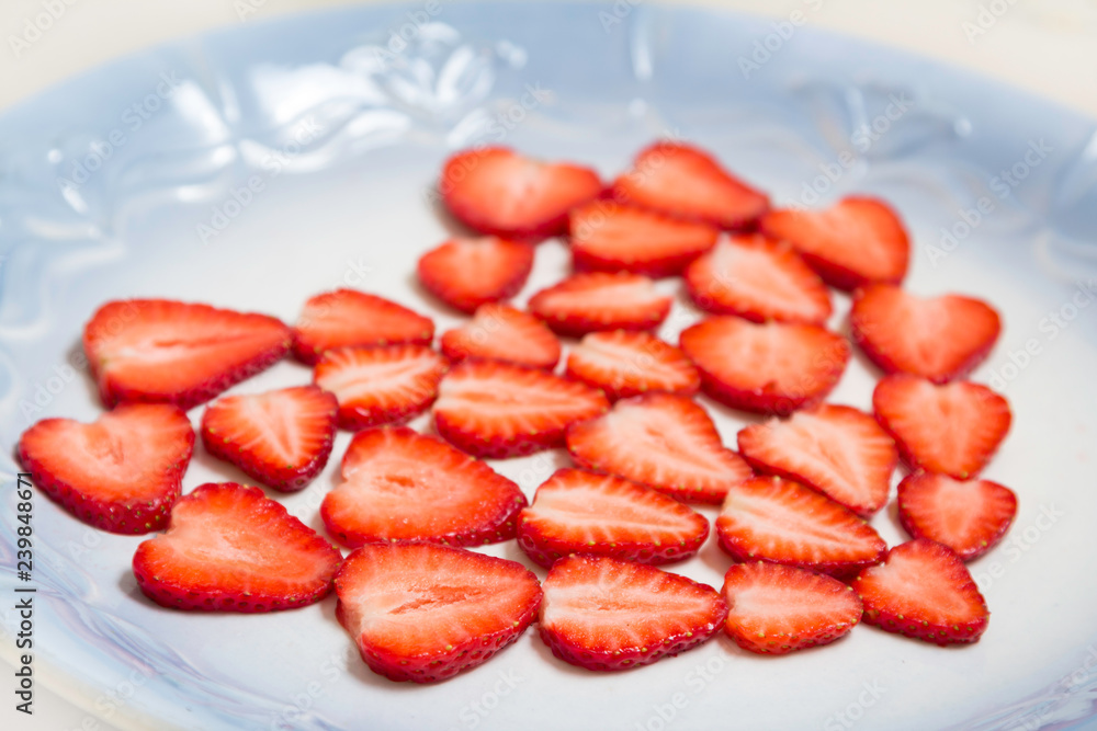 Beautiful heart symbol from chopped red juicy strawberry Beautiful heart symbol from chopped red juicy strawberry