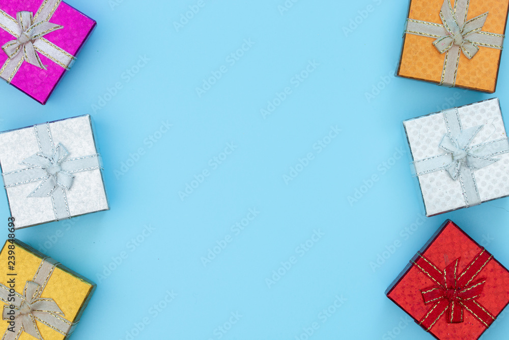 Gift boxes for Birthday, Christmas and new year on blue background with free text space Gift boxes for Birthday, Christmas and new year on blue background with free text space