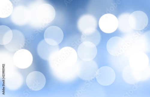 Lights or blurred bokeh on blue gradient background