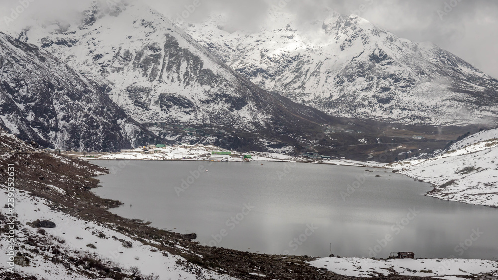 Sarathang lake surrounded by snow covered mountains on all side near Changu lake in May, Sikkim, India