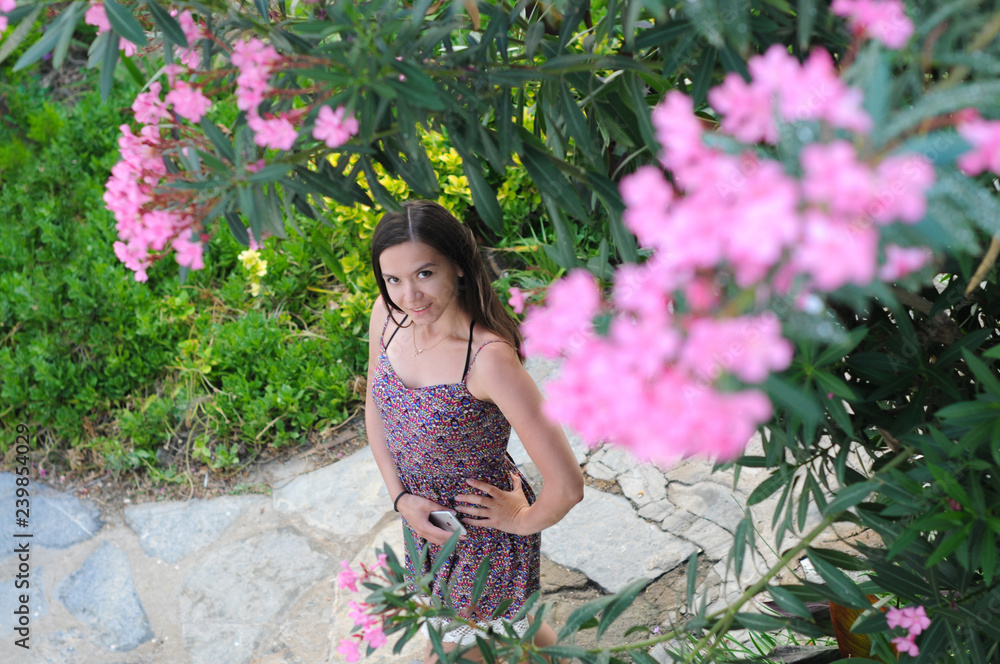 Beautiful girl in pink colors. Summer. The sun. Relaxation Beautiful girl in pink colors. Summer. The sun. Relaxation