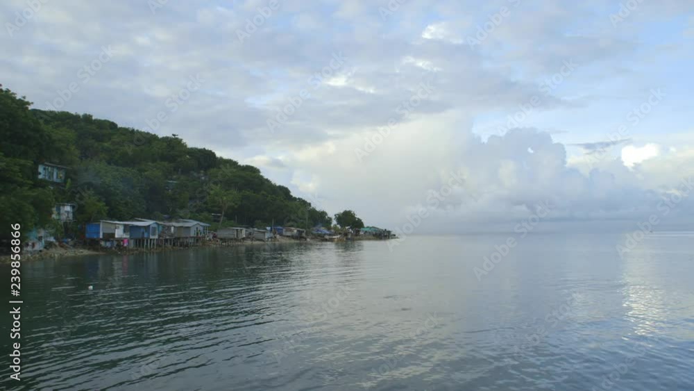 Time lapse shot of from water to land of a fishing village in Papua new Guinea Time lapse shot of from water to land of a fishing village in Papua new Guinea