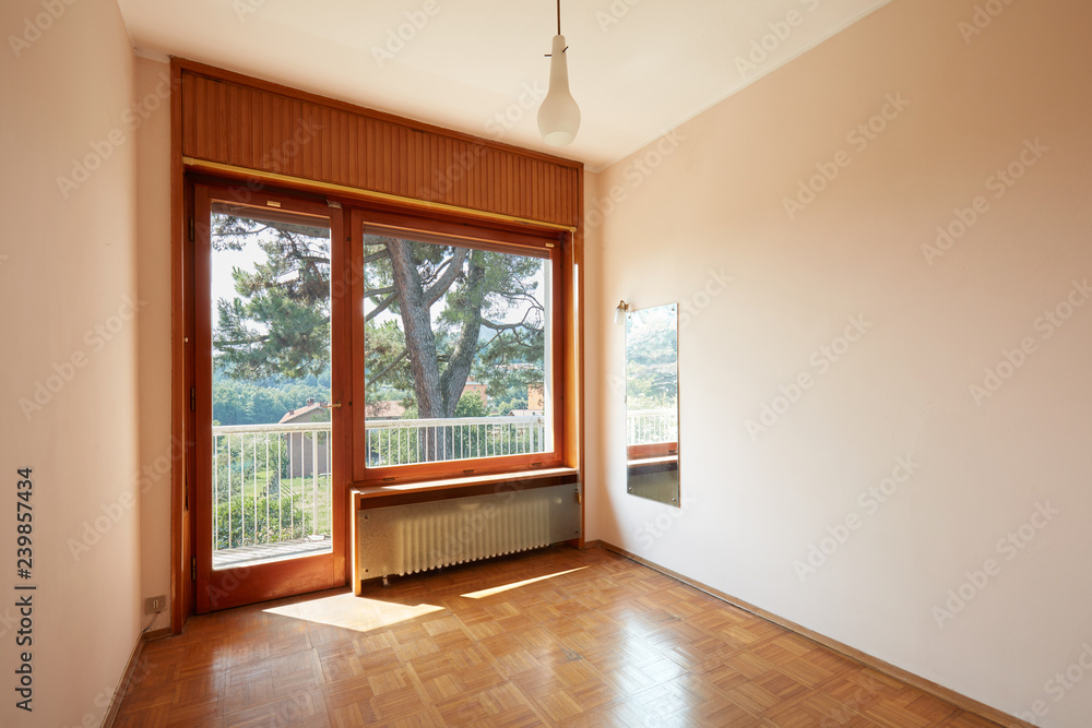 Fototapeta premium Empty room interior with parquet floor and terrace in country house, sunlight