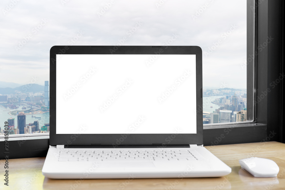 Mock up Blank screen of Laptop on wooden table with clipping path blurred background. Mock up Blank screen of Laptop on wooden table with clipping path blurred background.