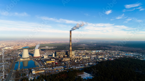 Garbage incineration plant. Waste incinerator plant with smoking smokestack. The problem of environmental pollution by factories photo