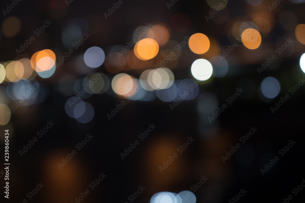 Defocused city night light blurred with bokeh abstract background. Defocused city night light blurred with bokeh abstract background.