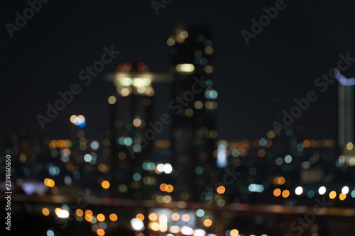 Defocused city night light blurred with bokeh abstract background. © taira42