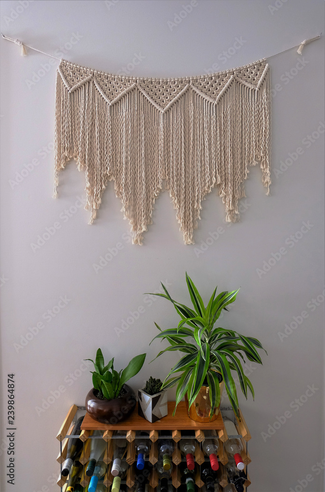 A large macrame wall hanging home decoration. Hand-made from 100