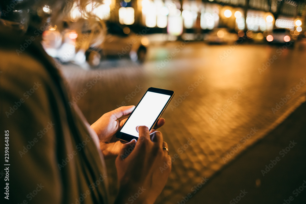 Close-up woman using mobile phone