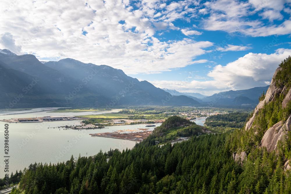 Scenic Aerial View of Seaside Town Surrounded by Towering  Forested Mountains on a Summer Late Afternoon. Squamish, Bc, Canada.BC, Canada.