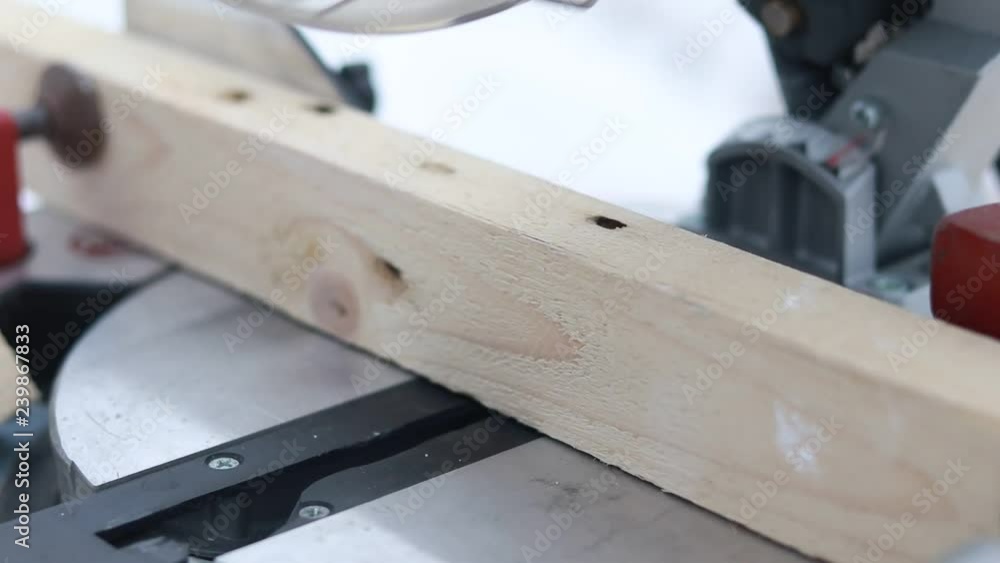 face saw. sawing a piece of wood. close-up. shallow depth of field. face saw. sawing a piece of wood. close-up. shallow depth of field.