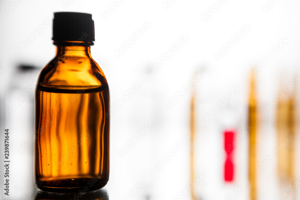 Group of ampoules with a transparent medicine in medical laboratory Group of ampoules with a transparent medicine in medical laboratory