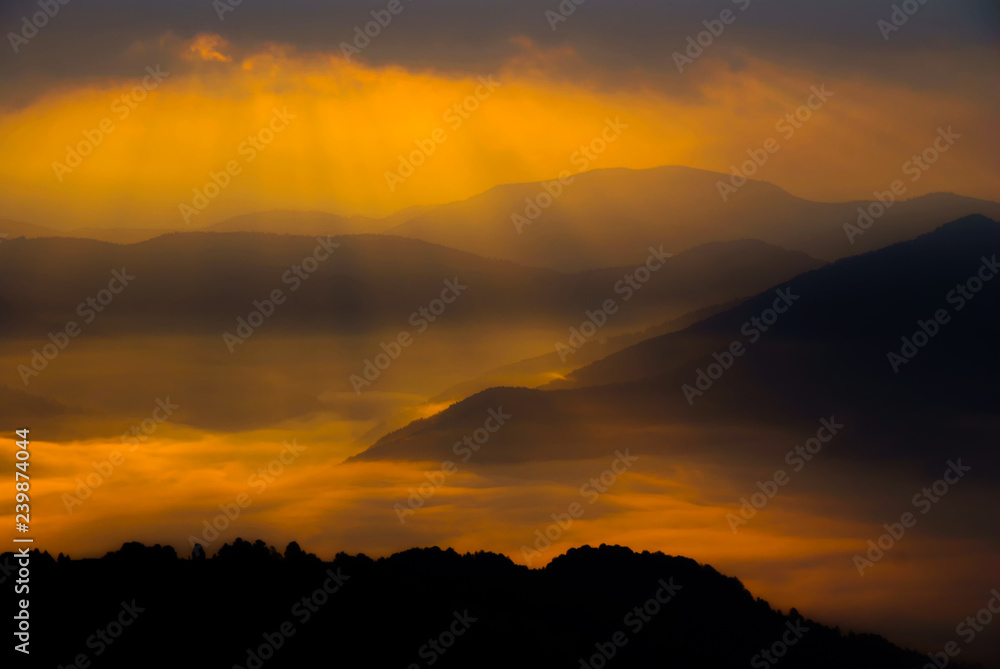 A delightful sunrise. mountain ranges in the morning rays. Svydovets ridge. Carpathian mountains. Ukraine