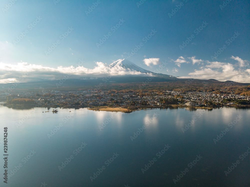 Aerial view over lake Kawaguchi, located in the border Fujikawaguchiko and Minobu, southern Yamanashi Prefecture near Mount Fuji, Japan. Lake Kawaguchi is a very popular tourist spot near Fuji Japan.